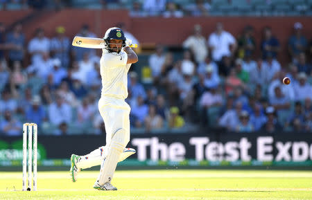 India's Cheteshwar Pujara looks on after playing a shot during day one of the first test match between Australia and India at the Adelaide Oval in Adelaide, Australia, December 6, 2018. APP/Dave Hunt via REUTERS