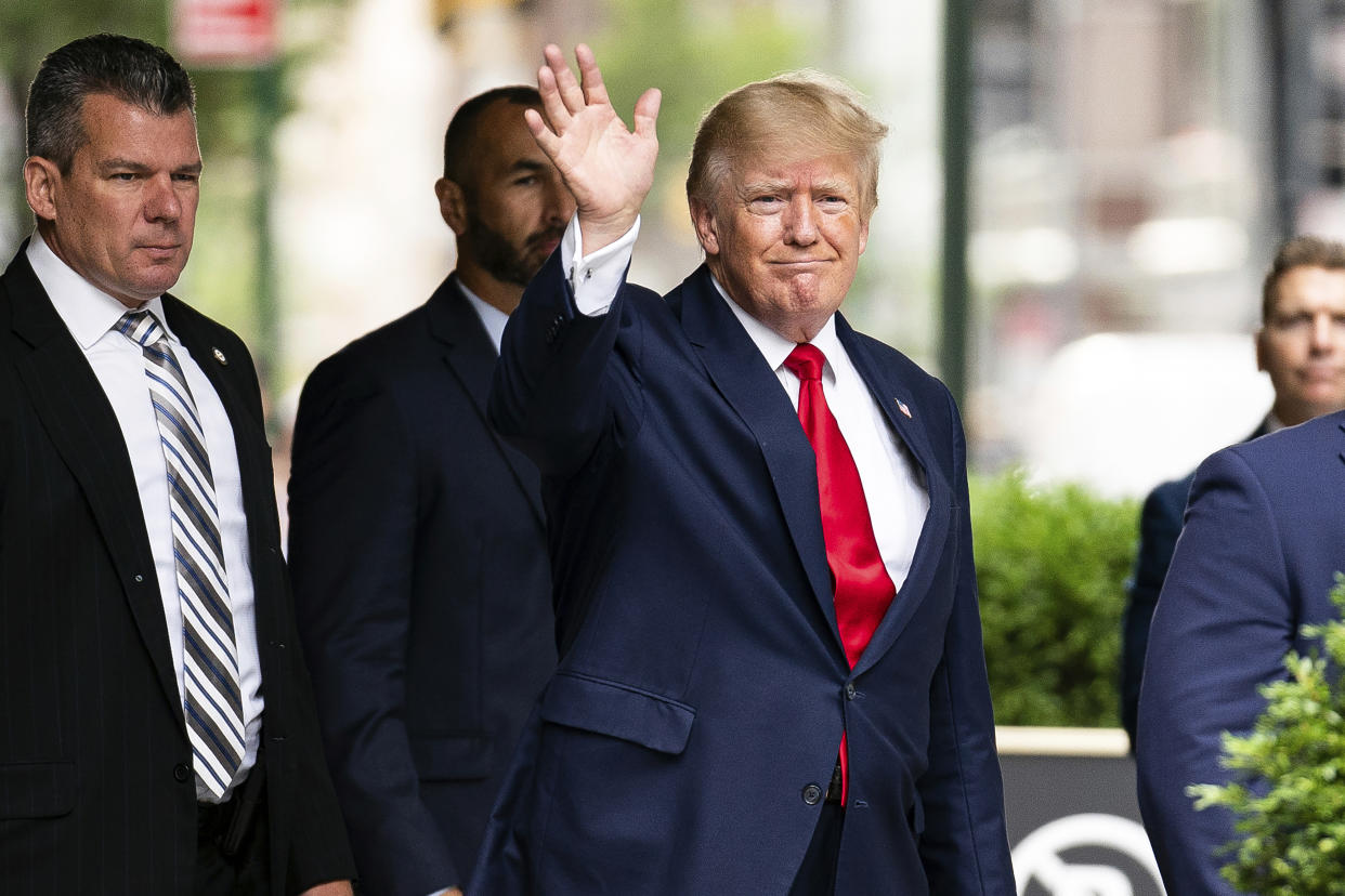 Former President Donald Trump waves as he departs Trump Tower, Wednesday, Aug. 10, 2022, in New York. The stiffest penalty Donald Trump’s company could receive when it is sentenced Friday, Jan. 13, 2023, by a New York judge for helping its executives dodge taxes is a $1.6 million fine — not even enough to buy a Trump Tower apartment. (AP Photo/Julia Nikhinson, File )