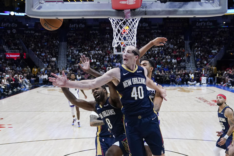 New Orleans Pelicans center Cody Zeller (40) battles for a rebound in the first half of an NBA basketball game against the Sacramento Kings in New Orleans, Wednesday, Nov. 22, 2023. (AP Photo/Gerald Herbert)