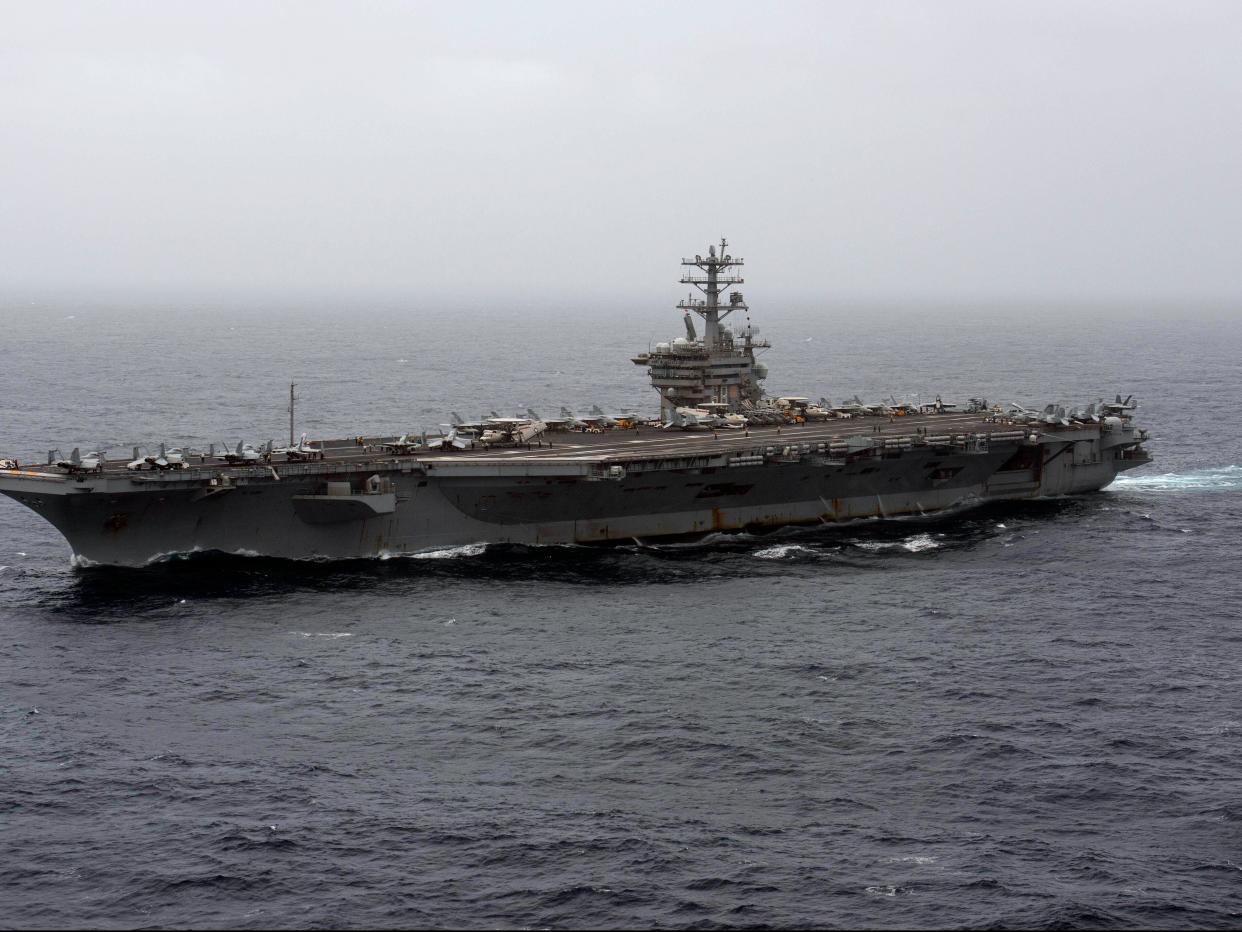 <p>The Pentagon announced on 3 January 2021 that it would reverse its decision to return the USS Nimitz home to the US West Coast</p> (AP)