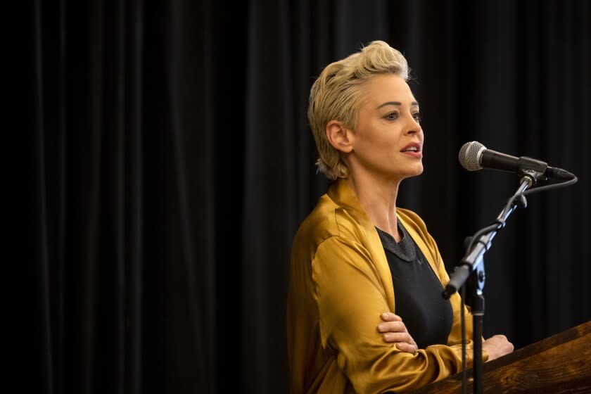 LOS ANGELES, CA - SEPTEMBER 12: Rose McGowan, actress, multimedia artist, and writer, speaks during a press conference at the Luxe Hotel Sunset Boulevard on Sunday, Sept. 12, 2021 in Los Angeles, CA. Rose McGowan and Larry Elder hold a press conference to discuss her allegations against Jennifer Siebel Newsom, Governor Gavin Newsom's wife. (Francine Orr / Los Angeles Times)