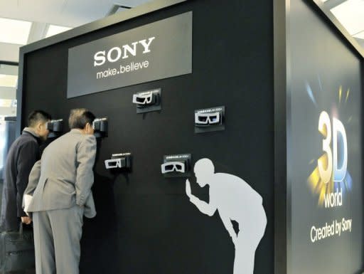 File photo shows visitors watching 3D images inside a black box through special glasses at the Sony showroom in Tokyo. Cyber attacks have hit Sony as it looks to recover from the impact on production of Japan's March 11 earthquake, with it facing additional costs for security upgrades and compensating consumers