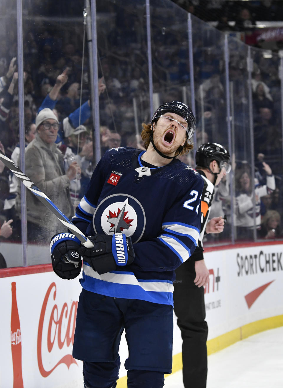 Winnipeg Jets' Mason Appleton (22) celebrates his goal against the New York Islanders during the second period of an NHL hockey game Tuesday, Jan. 16, 2024, in Winnipeg, Manitoba. (Fred Greenslade/The Canadian Press via AP)