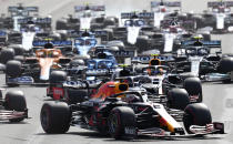 Red Bull driver Max Verstappen of the Netherlands, center, steers his car during the Formula One Grand Prix at the Baku Formula One city circuit in Baku, Azerbaijan, Sunday, June 6, 2021. (AP Photo/Darko Vojinovic)