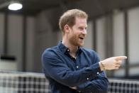 <p>Prince Harry speaks with wheelchair rugby athletes as he visits the Nippon Foundation Para Arena.</p>