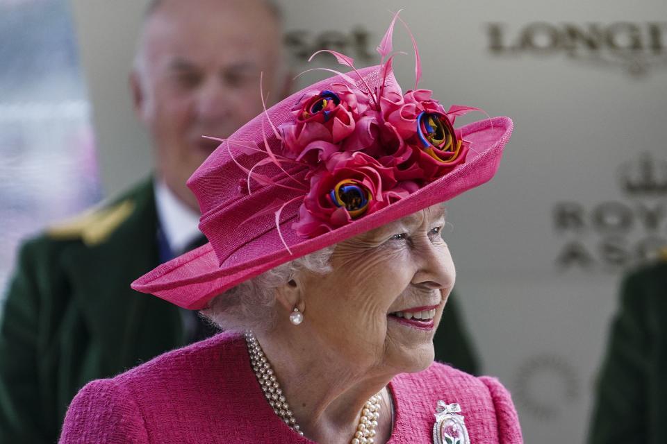 <p>The Queen on Ladies' Day at Royal Ascot in a bright pink ensemble. </p>