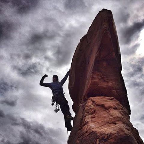 Photograph courtesy Cedar Wright Alex Honnold climbing on Lighthouse Tower near Moab, Utah.