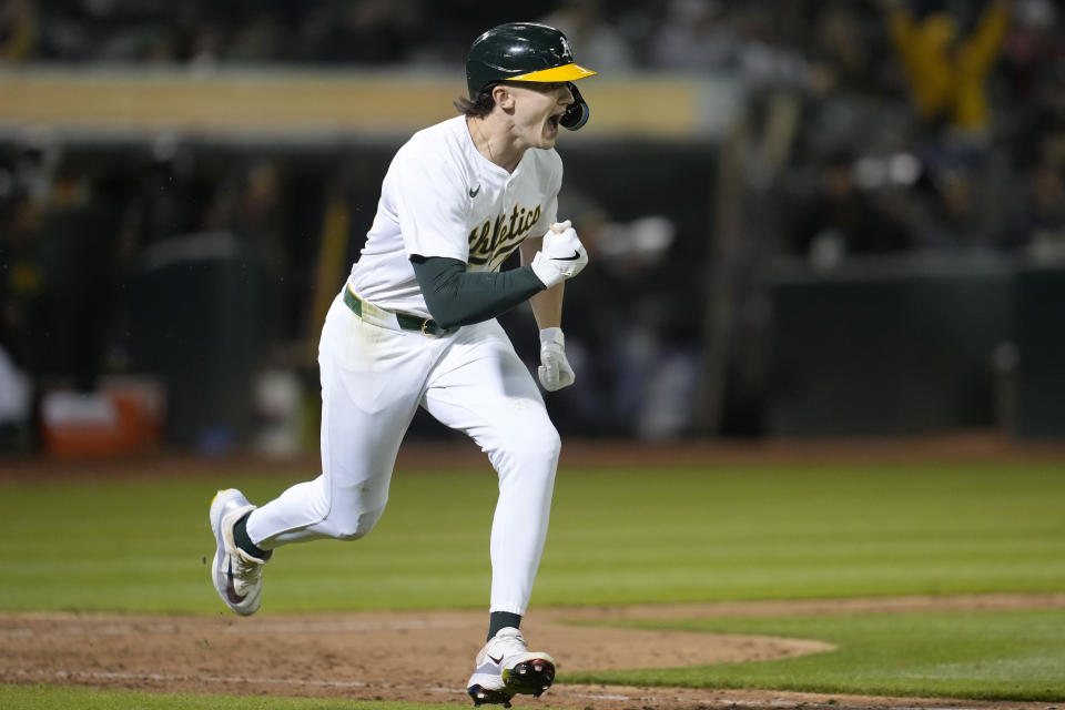 Oakland Athletics' Zack Gelof reacts after hitting an RBI single against the Colorado Rockies during the ninth inning of a baseball game in Oakland, Calif., Wednesday, May 22, 2024. (AP Photo/Jeff Chiu)