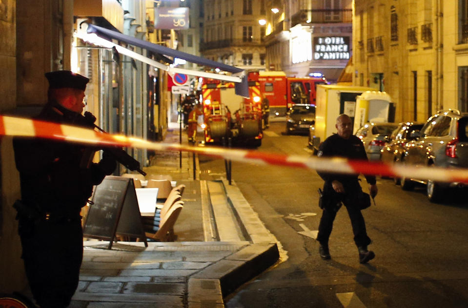 <p>Police officers cordon off the area after a knife attack in central Paris, Saturday May 12, 2018. (Photo: Thibault Camus/AP) </p>