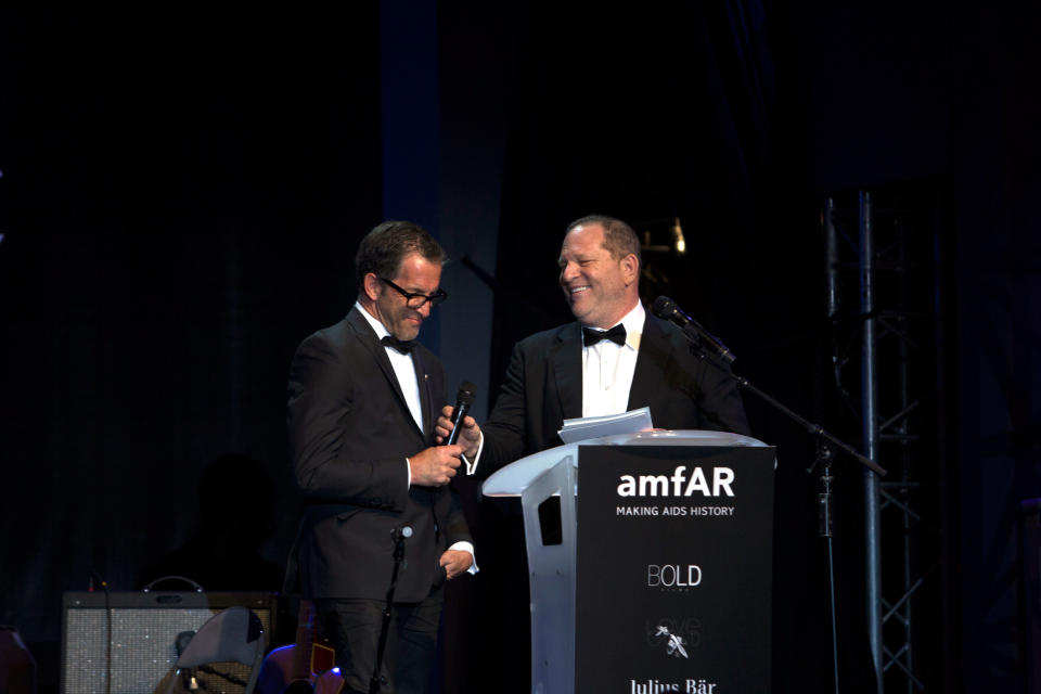 CAP D'ANTIBES, FRANCE - MAY 23:  (L-R) Kenneth Cole and Harvey Weinstein onstage during the show for amfAR's 20th Annual Cinema Against AIDS at Hotel du Cap-Eden-Roc on May 23, 2013 in Cap d'Antibes, France.  (Photo by Kevin Tachman/WireImage)