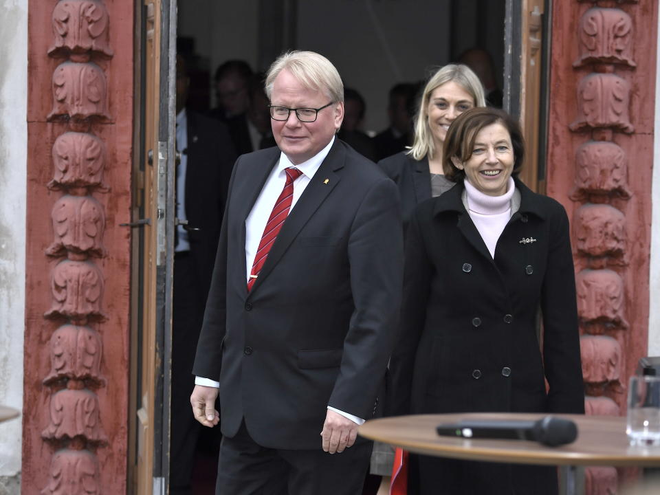 Sweden's Defence Minister Peter Hultqvist, left, and France's Defence Minister Florence Parly arrive for a press briefing at Karlberg Castle in Stockholm, Sweden, Friday Sept. 24, 2021, after a European Intervention Initiative meeting with ministers or delegations leaders from Belgium, Denmark, Estonia, Finland, Germany, the Netherlands, Norway, Portugal, Spain, the United Kingdom and Italy. (Claudio Bresciani/TT via AP)