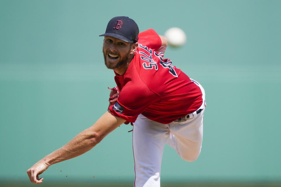 Boston Red Sox starting pitcher Chris Sale throws in the first inning of their spring training baseball game against the Detroit Tigers in Fort Myers, Fla., Monday, March 6, 2023. (AP Photo/Gerald Herbert)