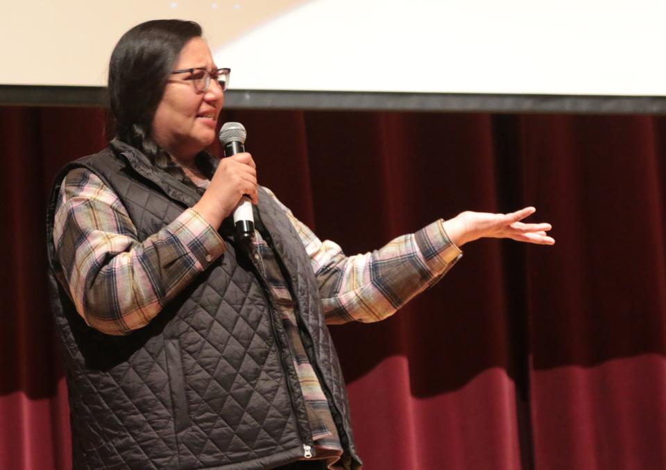 Jennifer Martel, producer of the film "Oyate" shares a few comments and answers questions after the film was shown at Central High School's theatre.