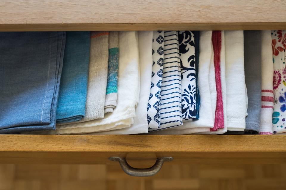 how to organize kitchen cabinets dish towel drawer