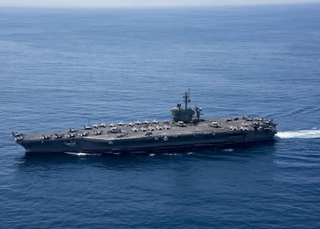 The aircraft carrier USS Carl Vinson (CVN 70) transits the Indian Ocean, April 15, 2017. Picture taken April 15, 2017. U.S. Navy photo by Mass Communication Specialist 3rd Class Matt Brown/Handout via REUTERS