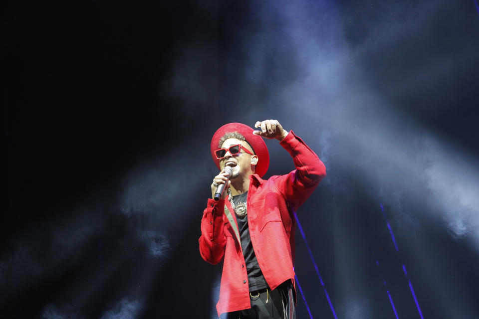 Singer Ozuna performs during the Coca-Cola Flow Reggaeton festival in Mexico City, Saturday, Nov. 23, 2019. (AP Photo/Ginnette Riquelme)