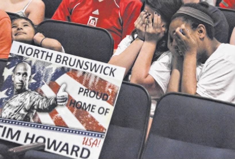 Sara Donnellan (left) and Renee Hales, both 13 and of North Brunswick, can’t watch as Belgium attacks the U.S. goal.