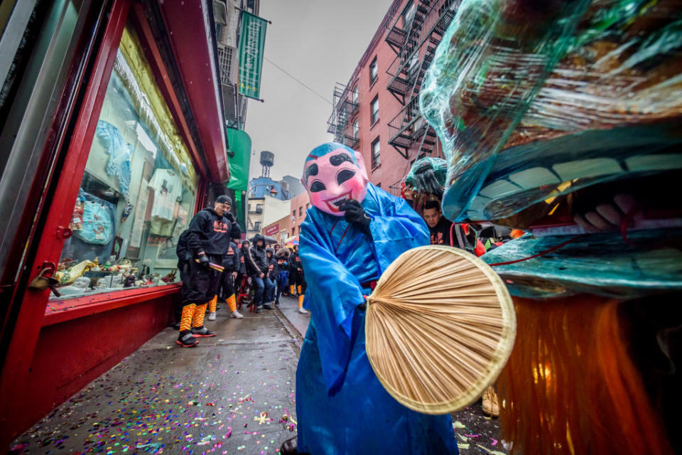 CHINATOWN, MANHATTAN, NY, UNITED STATES - 2020/01/25: A masked dancer at the parade in Chinatown. Traditional lion dances, drumming and dancing kept unfriendly ghosts clear of Chinatown as they roam the streets to welcome the Year of the Rat and ward off evil spirits. 2020 marks the 21st year that this event has been held in New York City. (Photo by Erik McGregor). (Photo by Erik McGregor/LightRocket via Getty Images)