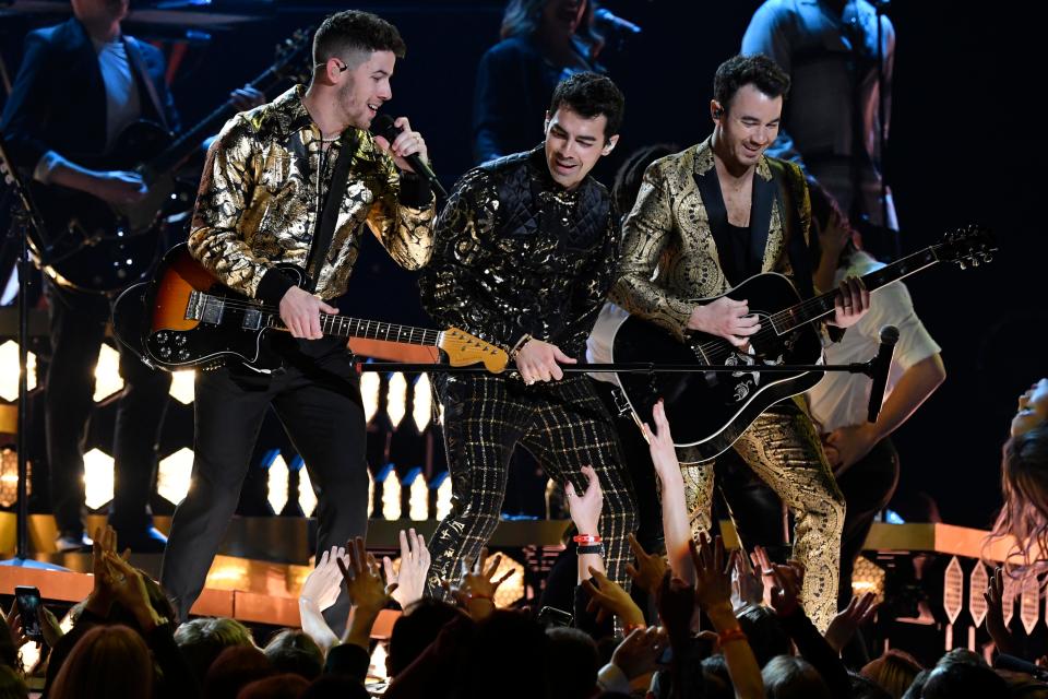 Nick Jonas, Joe Jonas and Kevin Jonas perform during the 62nd annual Grammy Awards on Jan. 26.