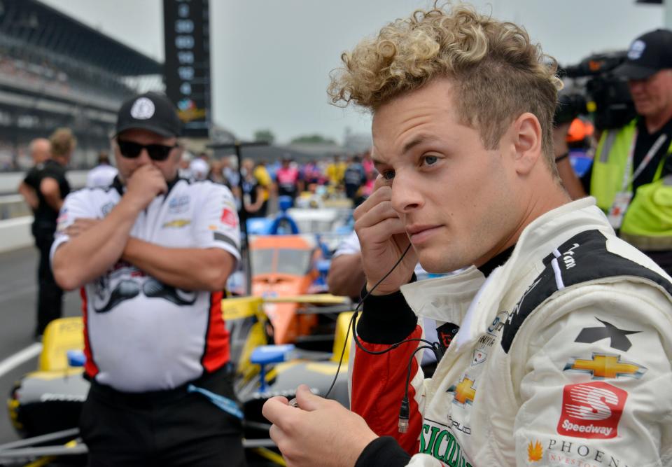 Dreyer & Reinbold Racing driver Santino Ferrucci (23) puts in his hearing protection Saturday, May 21, 2022, during the first day of qualifying for the 106th running of the Indianapolis 500 at Indianapolis Motor Speedway