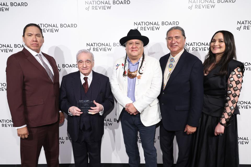 From left, William Belleau, Martin Scorsese, Yancey Red Corn, Talee Red Corn and Lily Gladstone pose on Jan. 11 with the Best Film award for "Killers of the Flower Moon" during the National Board Of Review 2024 Awards Gala at Cipriani 42nd Street in New York City.