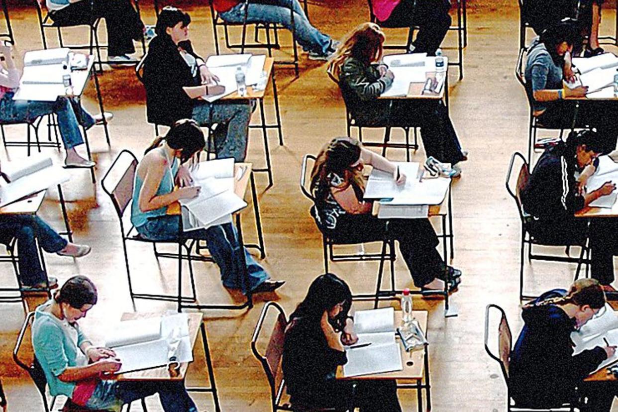 Heads down: A-levels and GCSEs are still hugely respected around the world: PA Wire