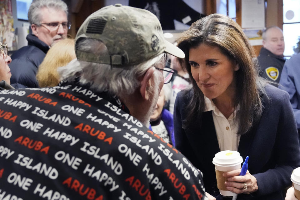 Republican presidential candidate former UN Ambassador Nikki Haley chats with guests while visiting Newfields Country Store during a campaign stop, Friday, Jan. 19, 2024, in Newfields, N.H. (AP Photo/Charles Krupa)