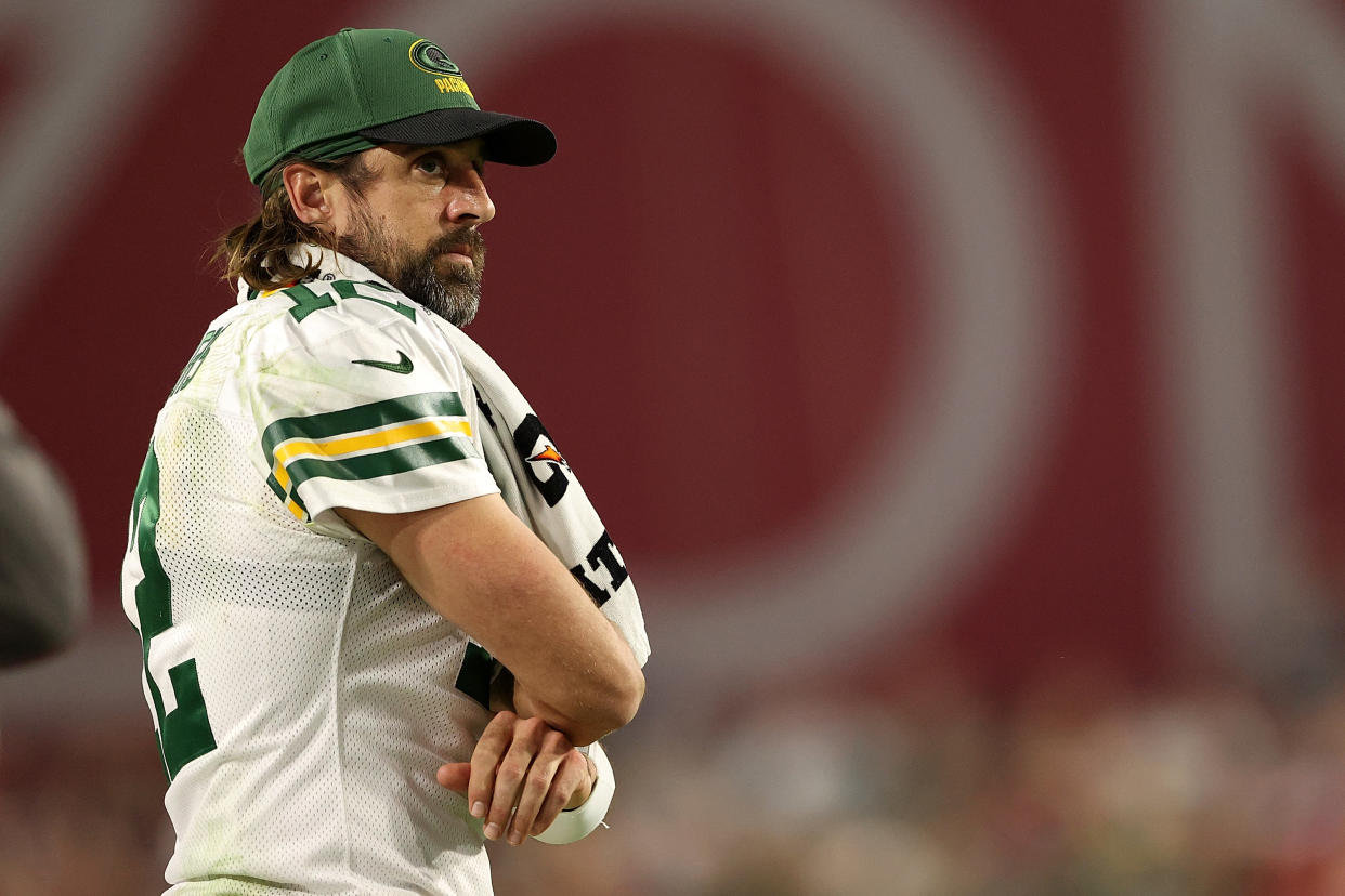 GLENDALE, ARIZONA - OCTOBER 28: Aaron Rodgers #12 of the Green Bay Packers watches action from the sideline during the second half of a game against the Arizona Cardinals at State Farm Stadium on October 28, 2021 in Glendale, Arizona. (Photo by Christian Petersen/Getty Images)
