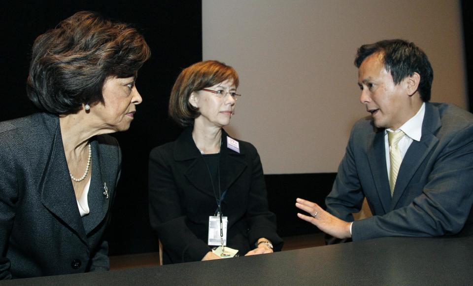 Dr. Michael C. Lu, associate administrator for the Maternal and Child Health Bureau of the Health Resources and Services Administration for the U. S. Department of Health and Human Services, right, confers with Dr. Yvonne T. Maddox, deputy director of the Eunice Kennedy Shriver National Institute of Child Health and Human Development, left, and Mississippi State Health Officer Dr. Mary Currier following their presentations at a gathering of public health researchers and students, health care professionals, community members and children's care advocates, Wednesday, Oct. 17, 2012 in Jackson, Miss., to discuss ways to reduce the state's infant mortality rate, which is the highest in the nation. In 2011, Mississippi had 9.4 deaths per 1,000 live births. The national rate was 6 deaths per 1,000 live births. The statistics are for children who die before reaching their first birthday. (AP Photo/Rogelio V. Solis)