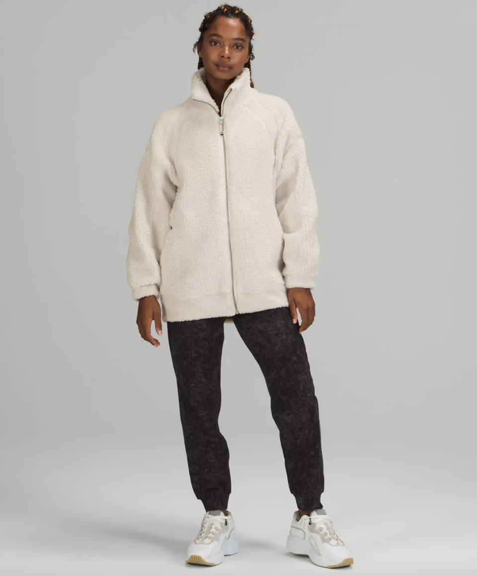 lululemon Long Textured Fleece Jacket in white with black pants