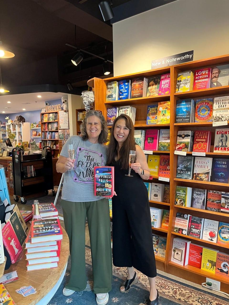 Author Angie Kim with bookseller Jen at Bards Alley Bookshop in Vienna, Virginia.