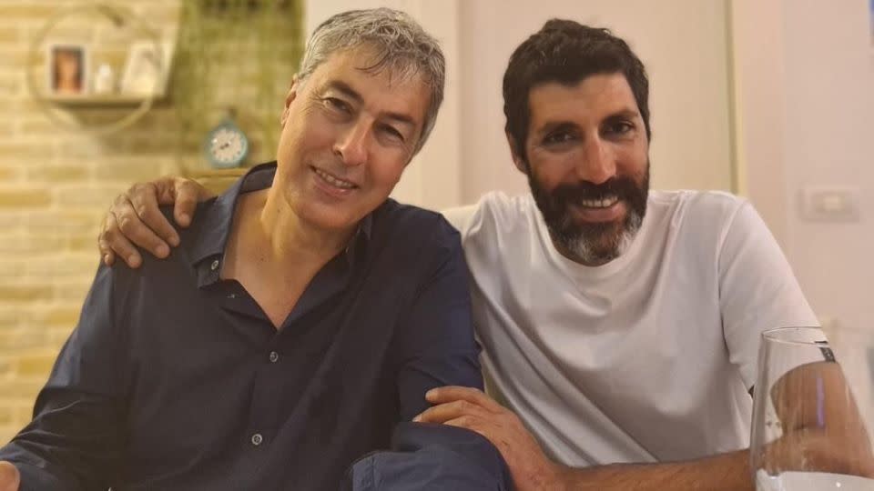 Bitton, right, pictured with his nephew Tamir Adar, who was murdered on October 7. - Yuval Bitton