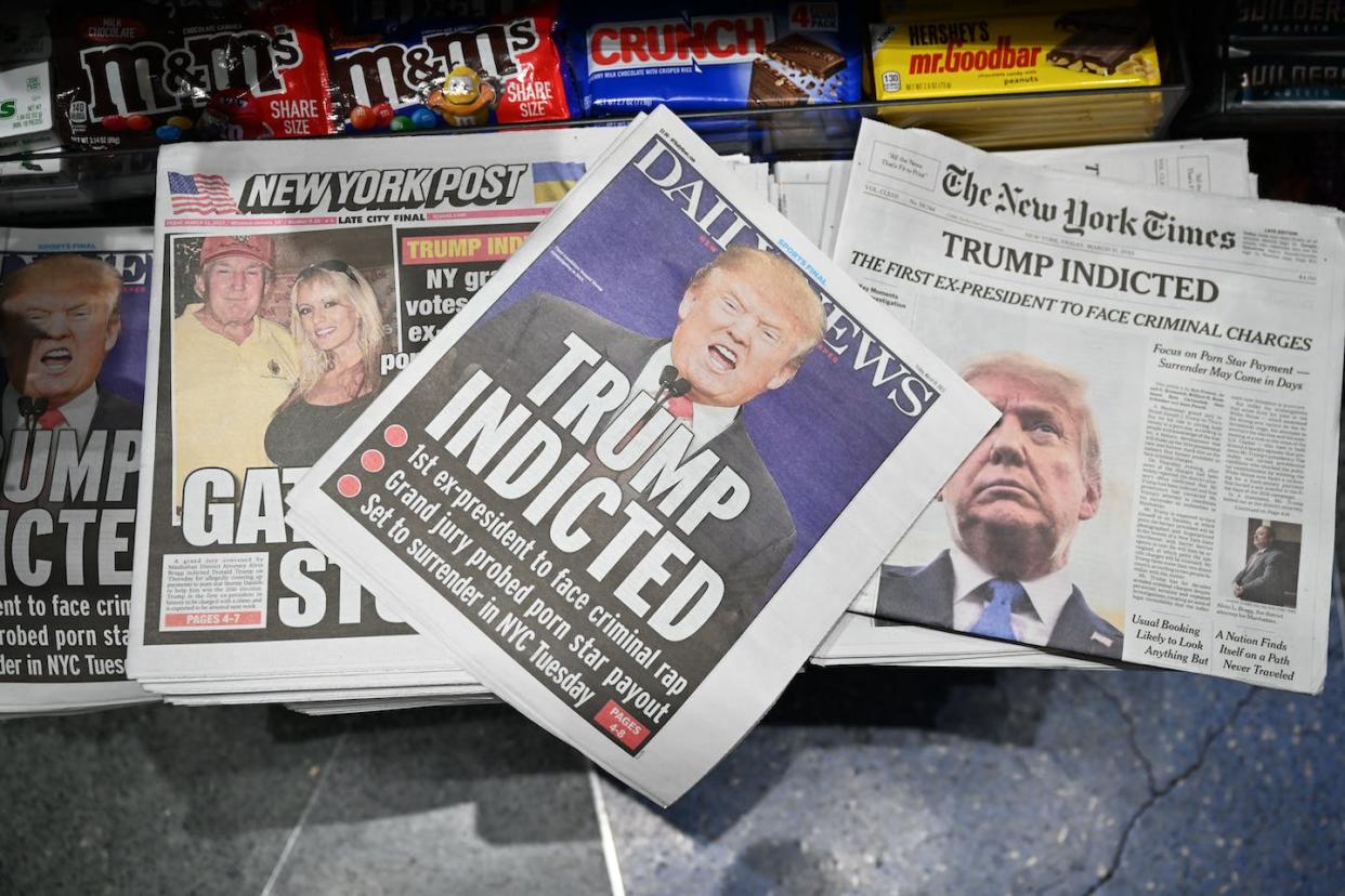 It was big news when a grand jury voted to indict former President Donald Trump. <a href="https://www.gettyimages.com/detail/news-photo/newspaper-front-pages-with-former-us-president-donald-trump-news-photo/1250118227?adppopup=true" rel="nofollow noopener" target="_blank" data-ylk="slk:Ed Jones/AFP via Getty Images;elm:context_link;itc:0;sec:content-canvas" class="link ">Ed Jones/AFP via Getty Images</a>