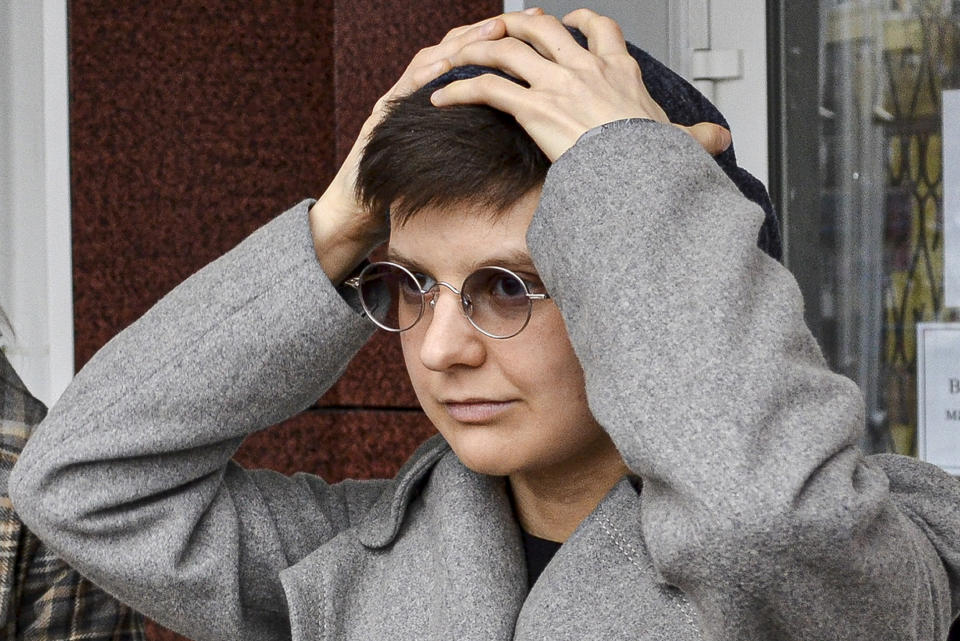 FILE- Feminist activist and artist Yulia Tsvetkova leaves after a court session in Komsomolsk-on-Amur, Russia, Monday, April 12, 2021. A court in Russia's far east on Friday, July 15, 2022 handed a rare acquittal to Tsvektova, a feminist artist who was charged with disseminating pornography after she shared artwork online depicting female bodies. (AP Photo/Alexander Permyakov, File)