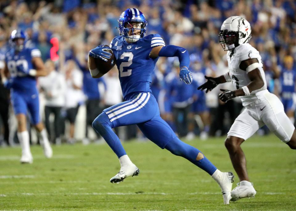 BYU receiver Chase Roberts runs for a touchdown against Cincinnati at LaVell Edwards Stadium in Provo on Sept. 29, 2023.