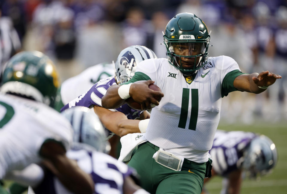 Baylor quarterback Gerry Bohanon (11) rushes for yardage against Kansas State during the first half of an NCAA college football game on Saturday, Nov. 20, 2021 in Manhattan, Kan. (AP Photo/Colin E. Braley)