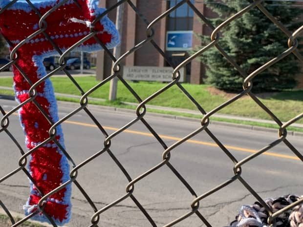 Community knitters created these knitted sevens in partnership with the Change Langevin School Committee to serve as a reminder of Treaty 7, which covers much of southern Alberta.