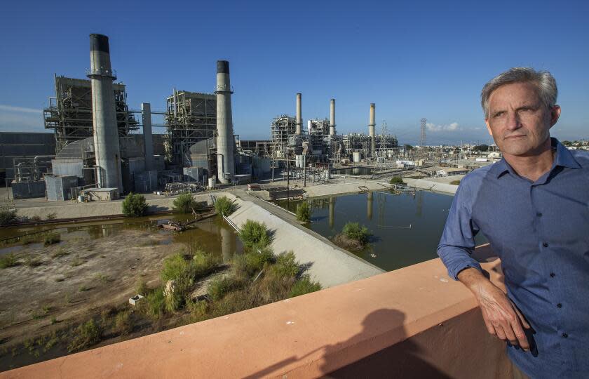 REDONDO BEACH, CA-NOVEMBER 22, 2019: Redondo Beach Mayor Bill Brand is photographed next to the AES Power Plant in Redondo Beach that is currently supposed to close in 2020 due to environmental regulations. California's State Water Resources Control Board is considering a request from the Public Utilities Commission to allow this power plant to stay open longer. Brand is opposed to the extension. (Mel Melcon/Los Angeles Times)