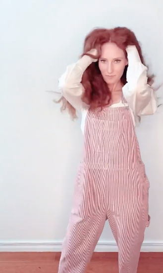 MAFS star Belinda Vickers models a pair of red and white striped overalls