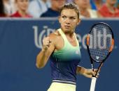 Aug 22, 2015; Cincinnati, OH, USA; Simona Halep (ROU) reacts against Jelena Jankovic (not pictured) in the semifinals during the Western and Southern Open tennis tournament at the Linder Family Tennis Center. Aaron Doster-USA TODAY Sports