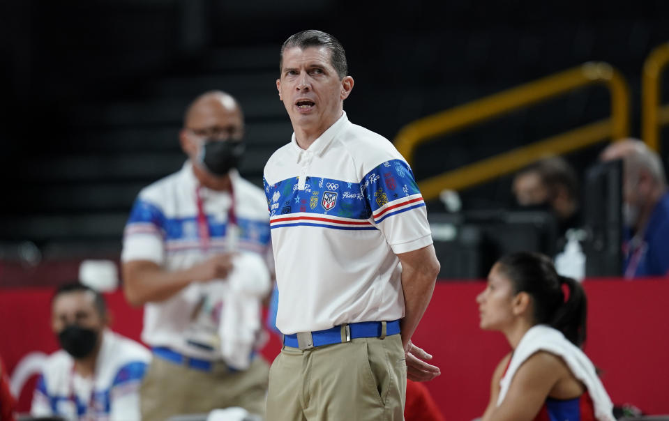 Puerto Rico's head coach Gerardo Batista Santiago reacts during women's basketball preliminary round game between Belgium and Puerto Rico at the 2020 Summer Olympics, Friday, July 30, 2021, in Saitama, Japan. (AP Photo/Charlie Neibergall)