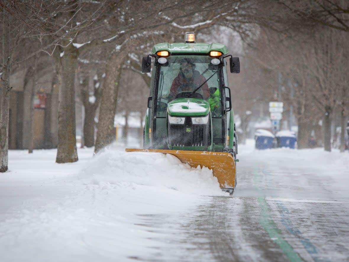 Snow removal companies that clear Toronto's sidewalks, driveways and parking lots face high insurance costs that are forcing some out of business. (Evan Mitsui/CBC - image credit)
