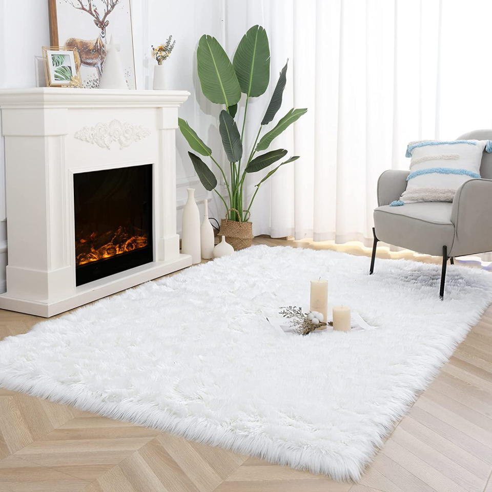 <p><a href="https://go.redirectingat.com?id=74968X1596630&url=https%3A%2F%2Fwww.walmart.com%2Fip%2FLochas-Soft-Fluffy-Rugs-Faux-Fur-Sheepskin-Area-Rug-for-Bedroom-Bedside-Living-Room-Carpet-Nursery-Washable-Floor-Mat-4-x6-White%2F362904607&sref=https%3A%2F%2Fwww.goodhousekeeping.com%2Fhome-products%2Fg44593527%2Fbest-rugs-walmart%2F" rel="nofollow noopener" target="_blank" data-ylk="slk:Shop Now;elm:context_link;itc:0;sec:content-canvas" class="link ">Shop Now</a></p><p>Faux Fur Area Rug</p><p>$52.99</p><p>walmart.com</p>