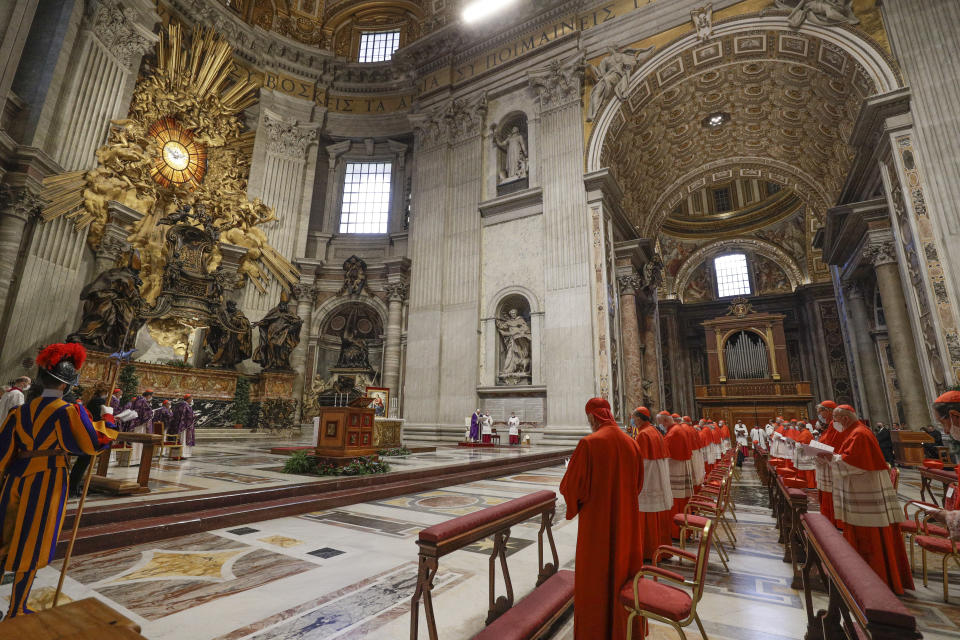 Pope Francis celebrates Mass the day after he raised 13 new cardinals to the highest rank in the Catholic hierarchy, at St. Peter's Basilica, Sunday, Nov. 29, 2020. (AP Photo/Gregorio Borgia, Pool)