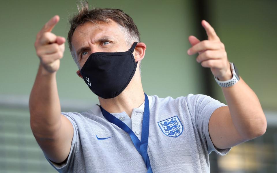 England Women's manager Phil Neville in the stands before the Barclays FA WSL match at The Academy Stadium, Manchester.  - PA