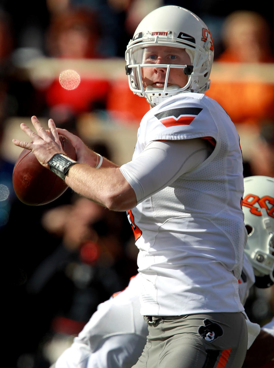 LUBBOCK, TX - NOVEMBER 12: Brandon Weeden #3 of the Oklahoma State Cowboys throws against the Texas Tech Red Raiders at Jones AT&T Stadium on November 12, 2011 in Lubbock, Texas. (Photo by Ronald Martinez/Getty Images)