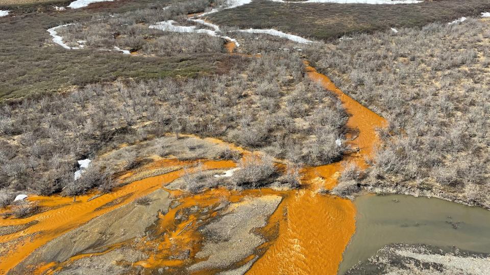 An orange tributary of Alaska's Kugororuk River / Credit: Josh Koch, U.S. Geological Survey