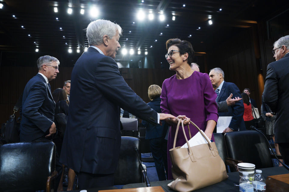 JPMorgan Chase & Company Chairman and CEO Jamie Dimon, left, greets Citigroup CEO Jane Fraser, after they testified at a Senate Banking Committee annual Wall Street oversight hearing, Thursday, Sept. 22, 2022, on Capitol Hill in Washington. (AP Photo/Jacquelyn Martin)