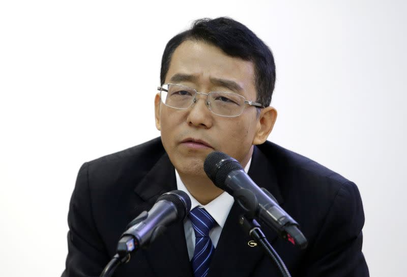 Feng Xingya, President of GAC Group, speaks at a news conference during a media preview of the Auto China 2018 motor show in Beijing