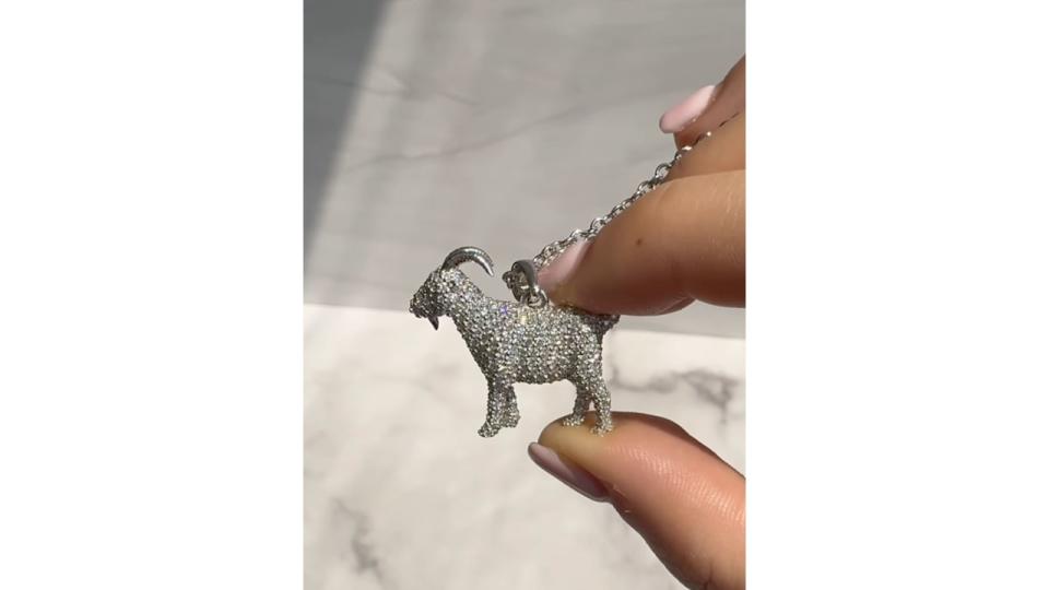 The pendant is a three-dimensional replica of a goat